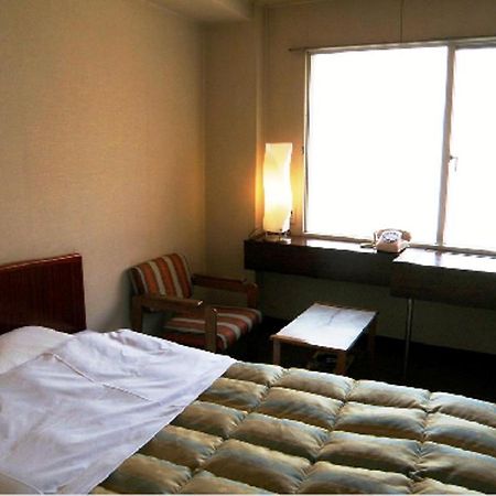 Business Hotel Tenmonkan Kagoshima Buitenkant foto