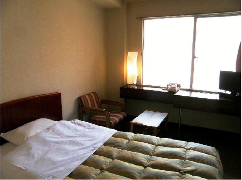 Business Hotel Tenmonkan Kagoshima Buitenkant foto
